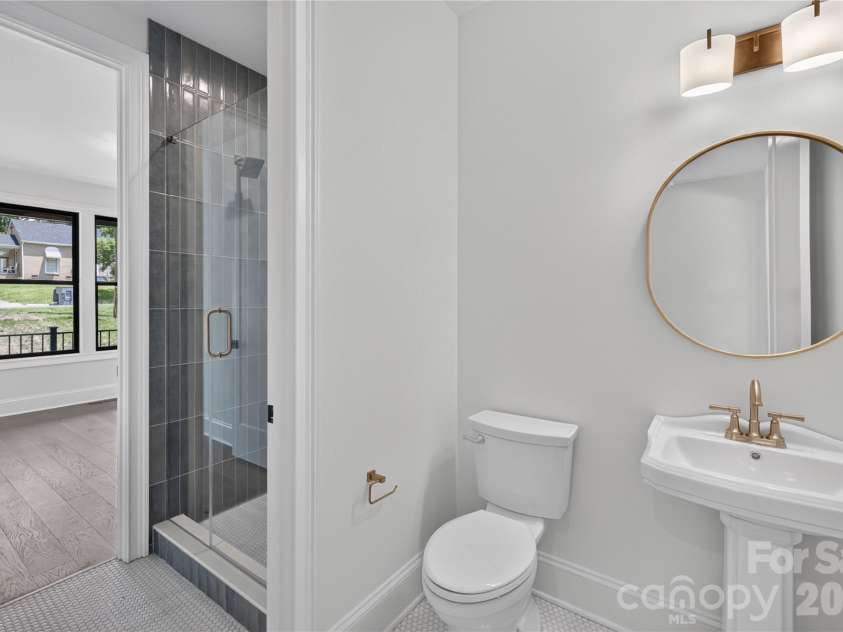 417 Cama Street, Charlotte, NC 28217.  MLS# CAR4380896, YatesRealty ID 26793. First Floor Bathroom