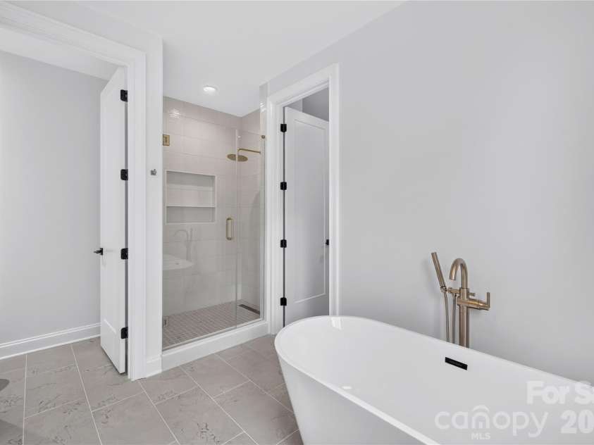 417 Cama Street, Charlotte, NC 28217.  MLS# CAR4380896, YatesRealty ID 26793. Primary Bathroom Upstairs