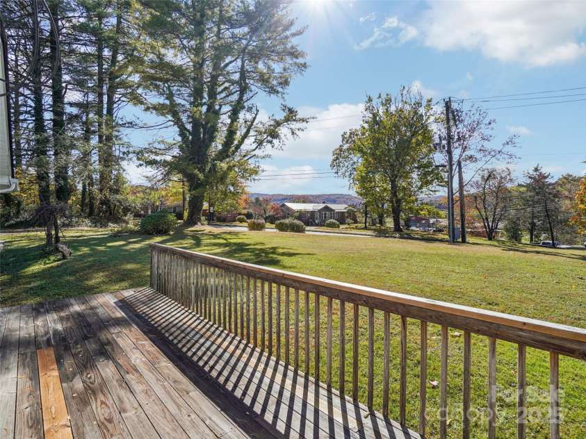 34 Parkview Drive, Brevard, NC 28712.  MLS# CAR4316145, YatesRealty ID 268. Side yard