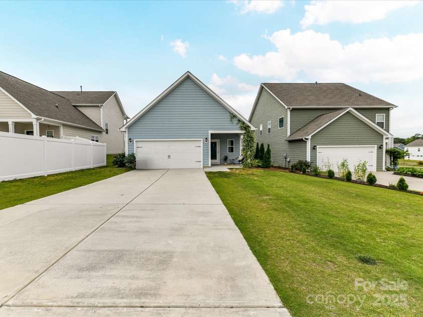 134 Kerri Dawn Lane, Locust, NC 28097.  MLS# CAR4294973, YatesRealty ID 26801. View of the back of your new home!