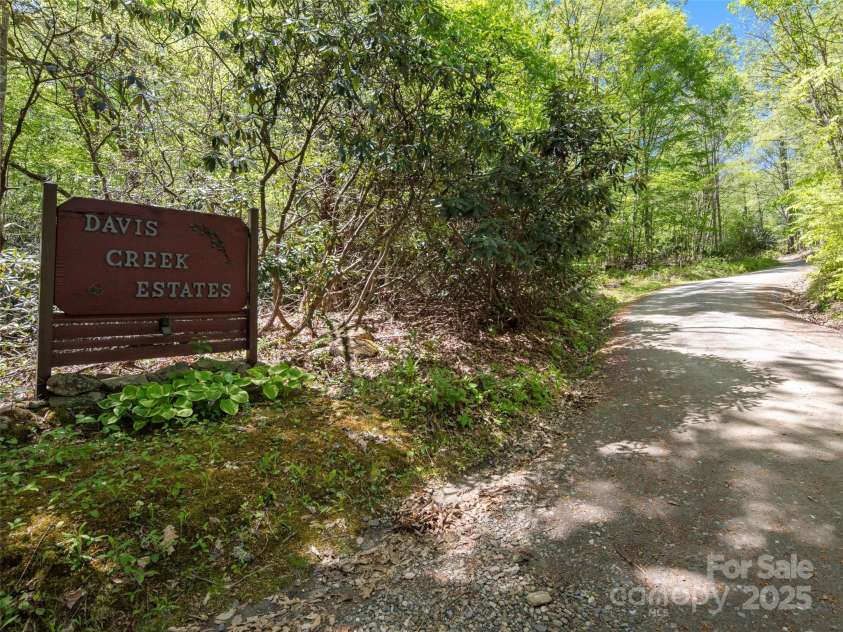 44 Sutton Knob Road, Candler, NC 28715.  MLS# CAR4252708, YatesRealty ID 26806. Entry Sign - Davis Creek Estates - Apgar Rd