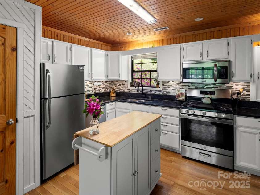 44 Sutton Knob Road, Candler, NC 28715.  MLS# CAR4252708, YatesRealty ID 26806. Kitchen