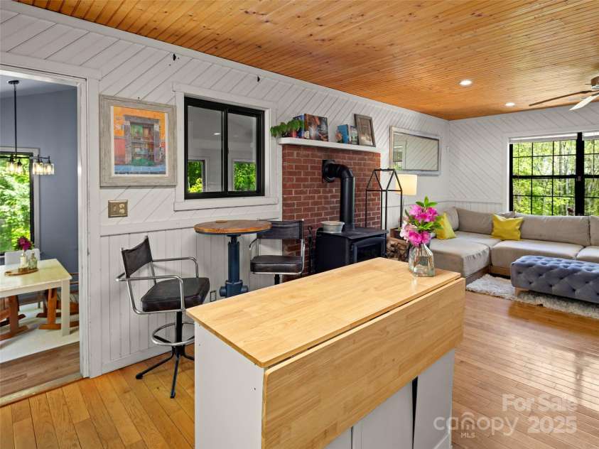 44 Sutton Knob Road, Candler, NC 28715.  MLS# CAR4252708, YatesRealty ID 26806. Kitchen & Living