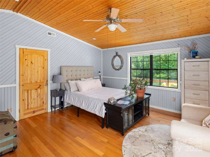 44 Sutton Knob Road, Candler, NC 28715.  MLS# CAR4252708, YatesRealty ID 26806. Primary Bedroom