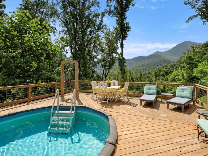 44 Sutton Knob Road, Candler, NC 28715.  MLS# CAR4252708, YatesRealty ID 26806. Salt water pool