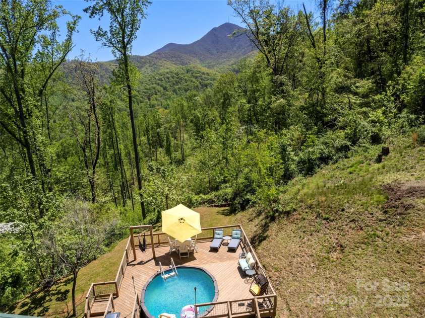 44 Sutton Knob Road, Candler, NC 28715.  MLS# CAR4252708, YatesRealty ID 26806. Salt Water Pool & Mt. Pisgah
