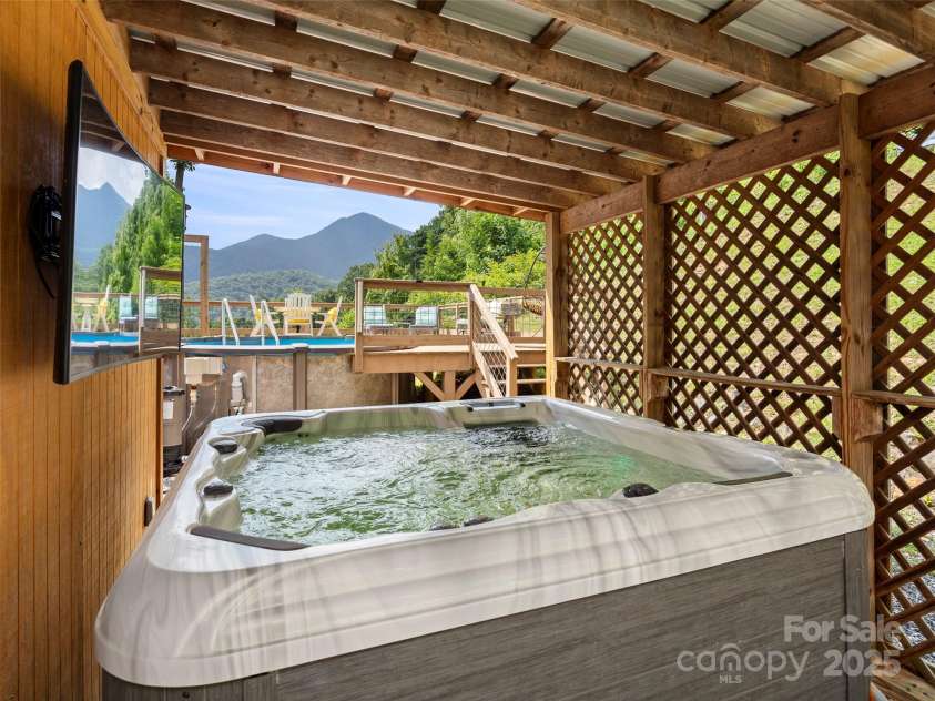 44 Sutton Knob Road, Candler, NC 28715.  MLS# CAR4252708, YatesRealty ID 26806. Spa