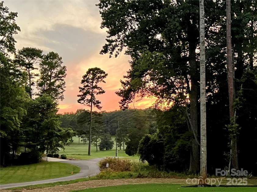 950 Nauvasse Trail, Fort Mill, SC 29715.  MLS# CAR4280299, YatesRealty ID 26808. Front Yard view of the Fort Mill Golf Course