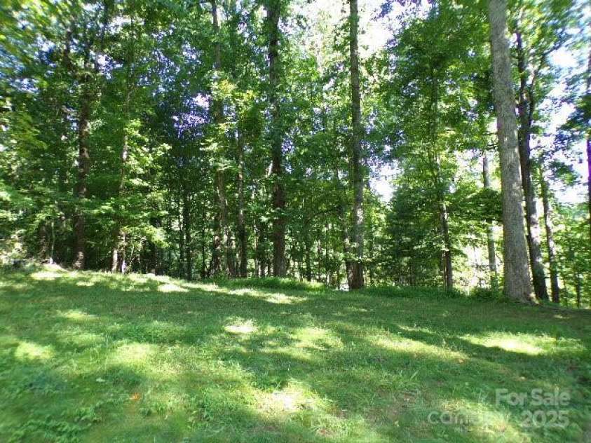 140 Beechwood Circle, Laurel Park, NC 28739.  MLS# CAR4281220, YatesRealty ID 26809. Backyard