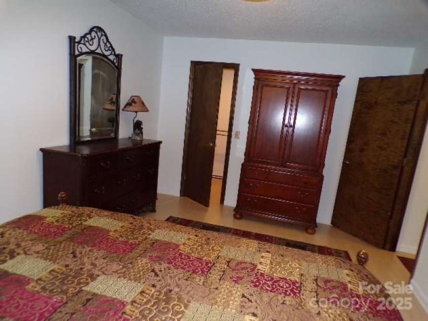 140 Beechwood Circle, Laurel Park, NC 28739.  MLS# CAR4281220, YatesRealty ID 26809. Primary bedroom