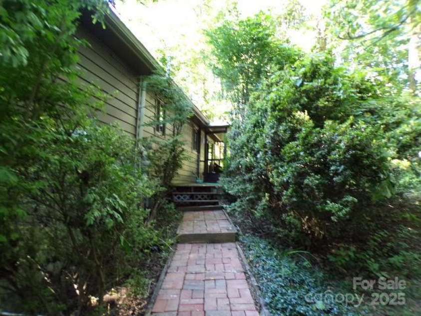 140 Beechwood Circle, Laurel Park, NC 28739.  MLS# CAR4281220, YatesRealty ID 26809. Rear Entrance