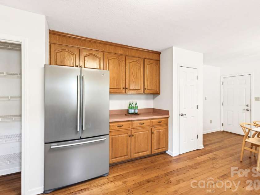 109 Lovers Loop Road, Asheville, NC 28803.  MLS# CAR4380982, YatesRealty ID 26814. Extra cabinets and workspace plus a pantry