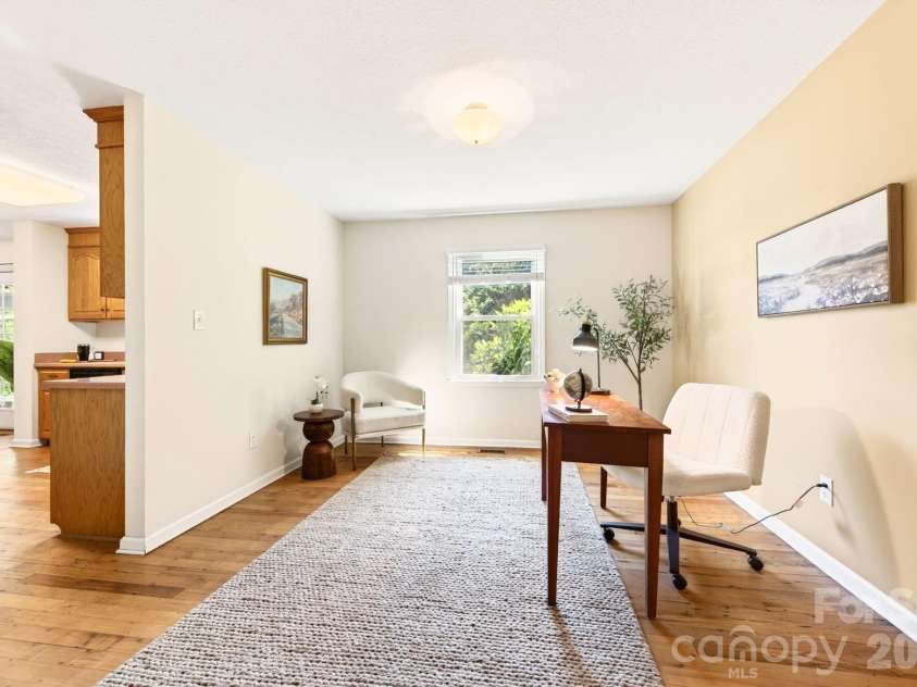 109 Lovers Loop Road, Asheville, NC 28803.  MLS# CAR4380982, YatesRealty ID 26814. Formal dining room being used as a main floor office