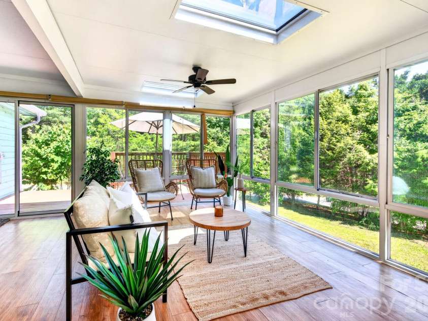 109 Lovers Loop Road, Asheville, NC 28803.  MLS# CAR4380982, YatesRealty ID 26814. Isn't this sunroom amazing?