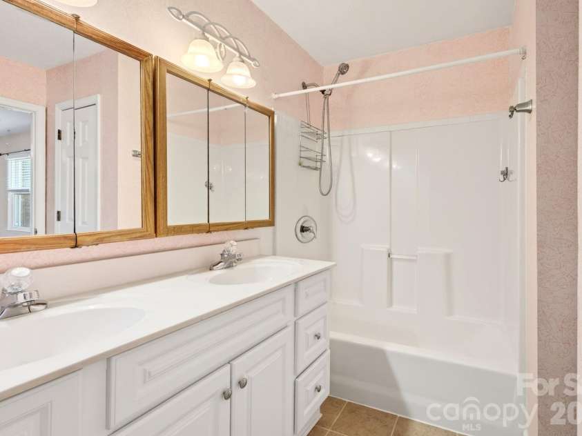 109 Lovers Loop Road, Asheville, NC 28803.  MLS# CAR4380982, YatesRealty ID 26814. Primary suite bathroom was recently remodeled