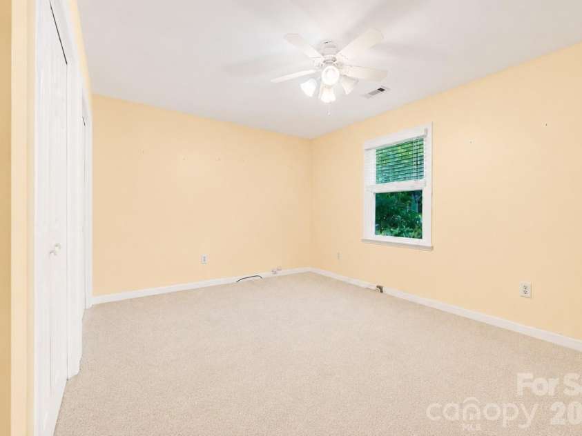 109 Lovers Loop Road, Asheville, NC 28803.  MLS# CAR4380982, YatesRealty ID 26814. Third upstairs bedroom
