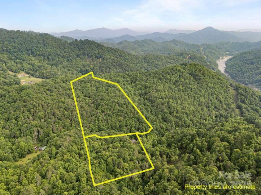 305 Pound Mill Branch Road, Green Mountain, NC 28740.  MLS# CAR4268058, YatesRealty ID 26814. 23+ Acres of privacy!