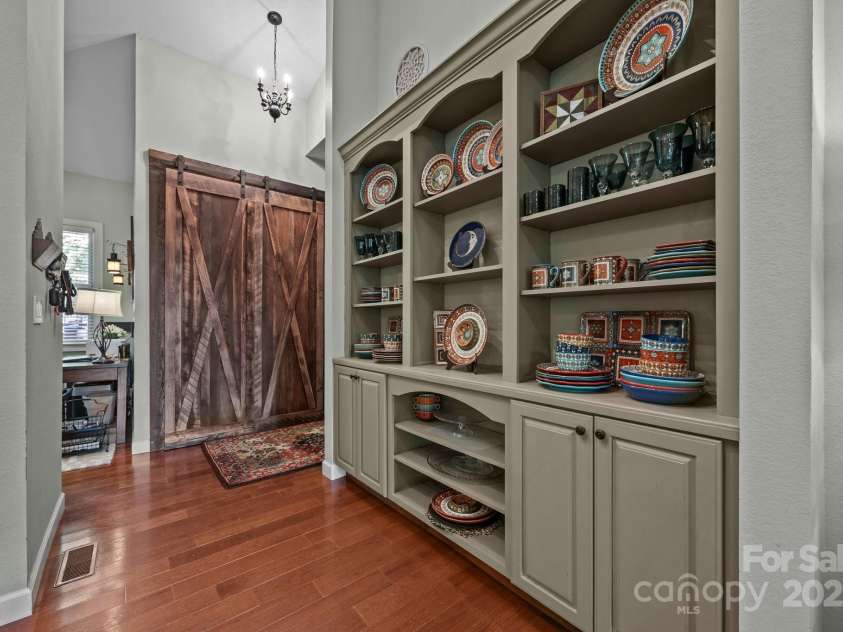 305 Pound Mill Branch Road, Green Mountain, NC 28740.  MLS# CAR4268058, YatesRealty ID 26814. Built-in cabinet perfect for storing dishes or displaying items.