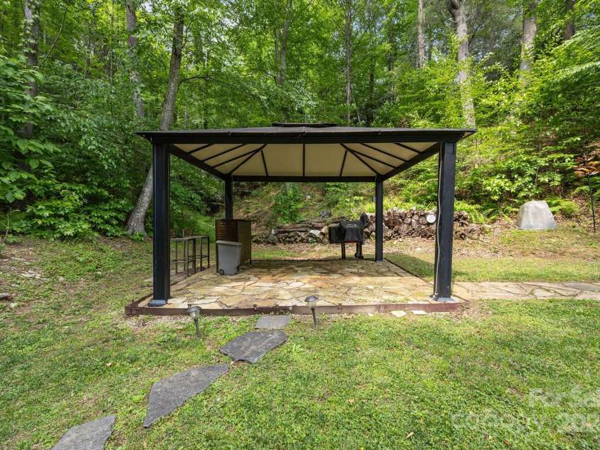 305 Pound Mill Branch Road, Green Mountain, NC 28740.  MLS# CAR4268058, YatesRealty ID 26814. Gazebo w/ electric. Perfect for grill, smoker, outdoor kitchen space or covered dining area.