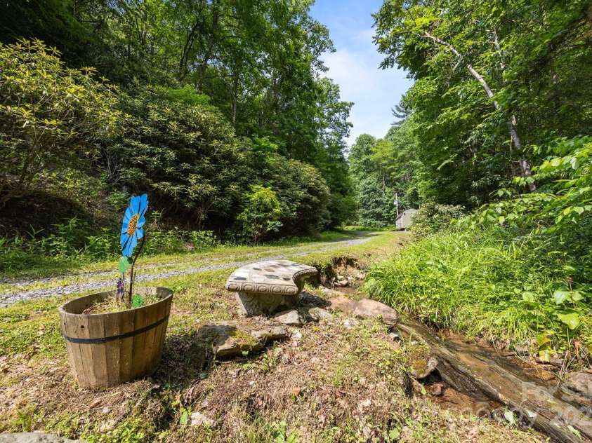 305 Pound Mill Branch Road, Green Mountain, NC 28740.  MLS# CAR4268058, YatesRealty ID 26814. Great spot for enjoying the surroundings!