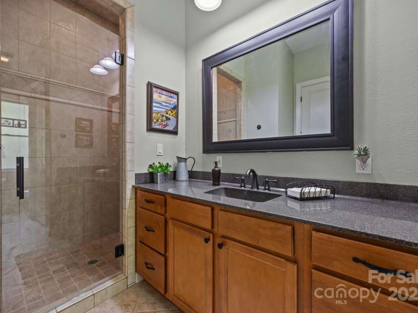 305 Pound Mill Branch Road, Green Mountain, NC 28740.  MLS# CAR4268058, YatesRealty ID 26814. Guest Bathroom