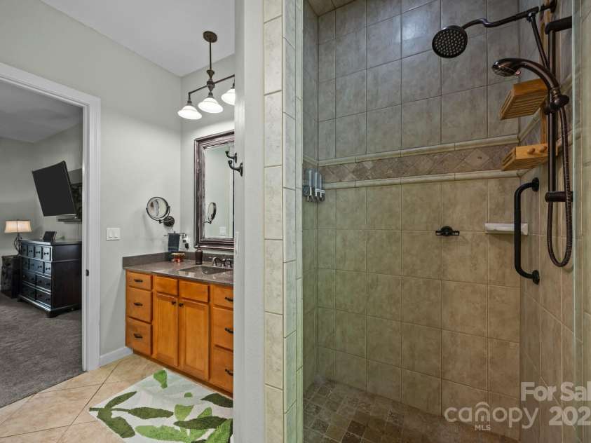 305 Pound Mill Branch Road, Green Mountain, NC 28740.  MLS# CAR4268058, YatesRealty ID 26814. Primary Bathroom