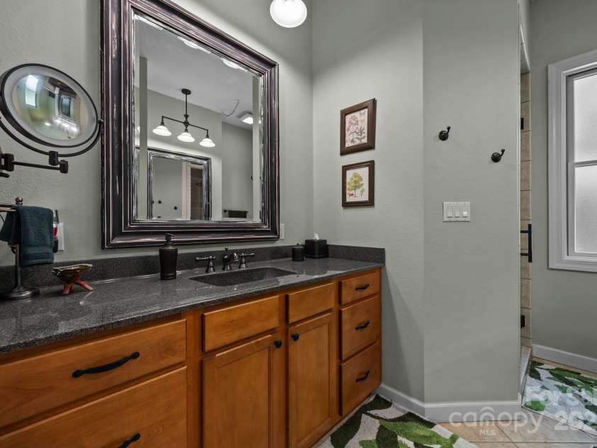305 Pound Mill Branch Road, Green Mountain, NC 28740.  MLS# CAR4268058, YatesRealty ID 26814. Primary Bathroom- Double sinks!
