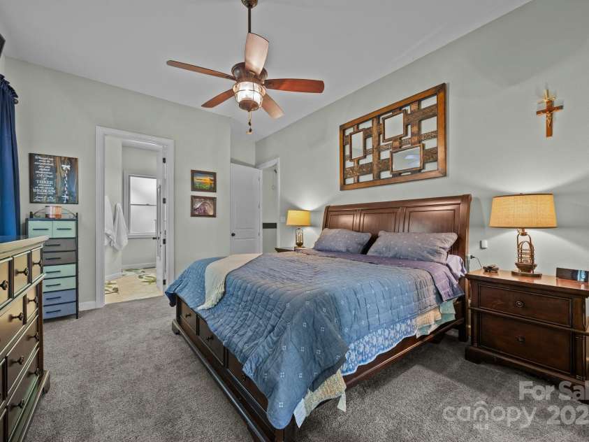 305 Pound Mill Branch Road, Green Mountain, NC 28740.  MLS# CAR4268058, YatesRealty ID 26814. Primary Bedroom w/ door access to covered front porch.