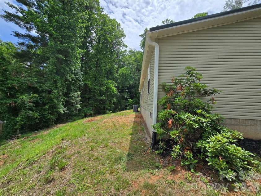 2094 Wilson Road, Asheville, NC 28806.  MLS# CAR4385974, YatesRealty ID 26822. Back view