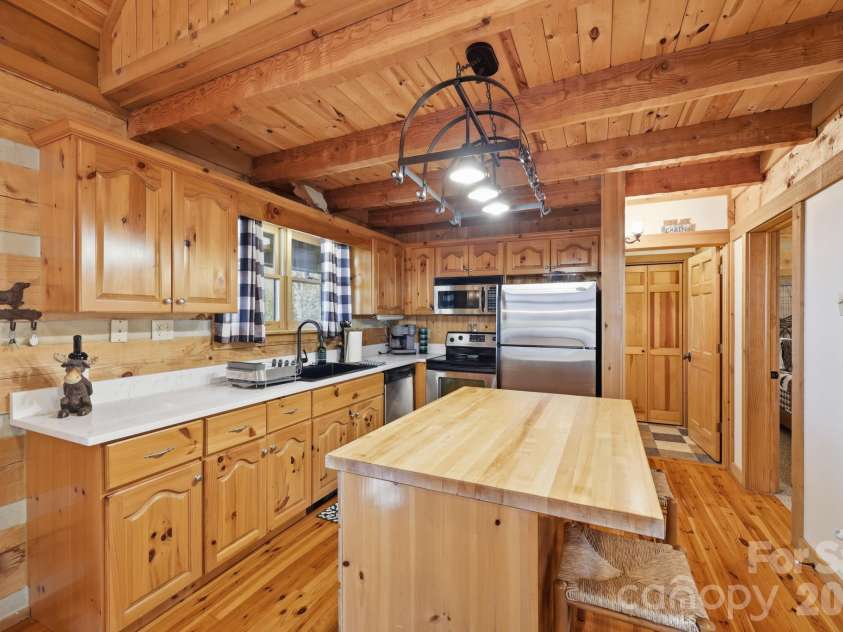 165 Little Boulder Lane, Seven Devils, NC 28604.  MLS# CAR4380097, YatesRealty ID 26823. 