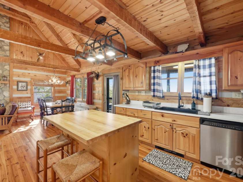 165 Little Boulder Lane, Seven Devils, NC 28604.  MLS# CAR4380097, YatesRealty ID 26823. 