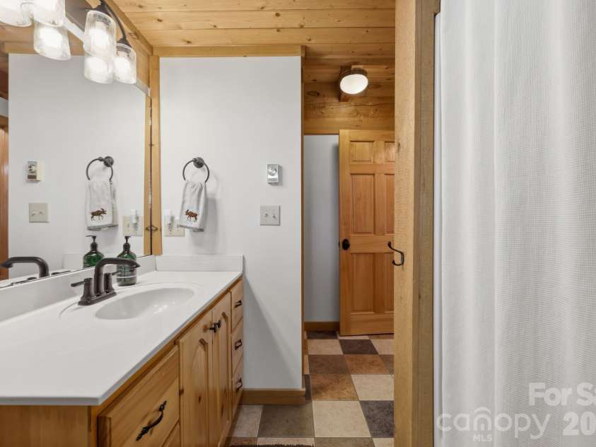 165 Little Boulder Lane, Seven Devils, NC 28604.  MLS# CAR4380097, YatesRealty ID 26823. 