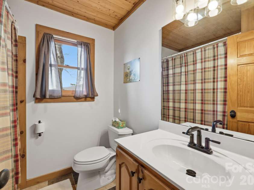 165 Little Boulder Lane, Seven Devils, NC 28604.  MLS# CAR4380097, YatesRealty ID 26823. 