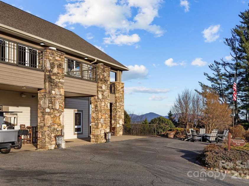 612 Vista Falls Road, Mills River, NC 28759.  MLS# CAR4220957, YatesRealty ID 26824. Pro-Golf side of th Clubhouse