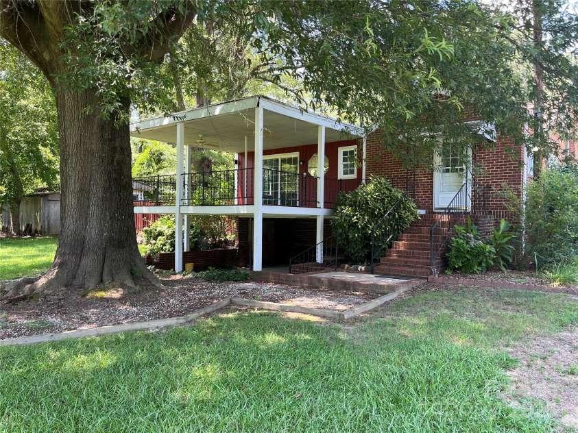 207 Leach Street, Biscoe, NC 27209.  MLS# CAR4283219, YatesRealty ID 26826. Back of home