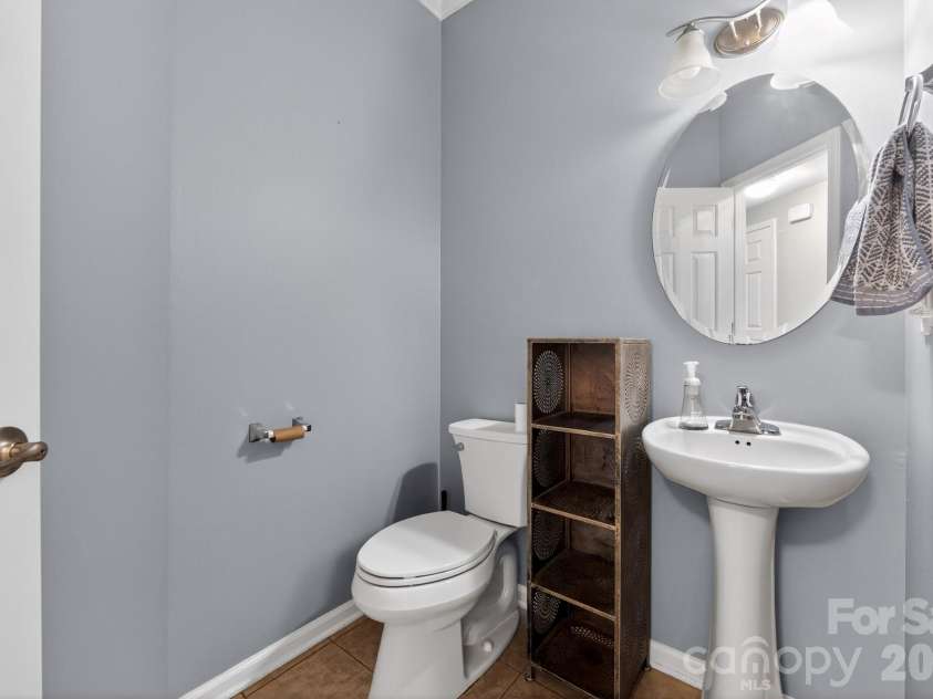11 Peppermill Drive, Asheville, NC 28804.  MLS# CAR4386908, YatesRealty ID 26829. Half Bath Main Level