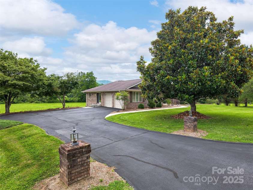 30 Beaumont Drive, Hendersonville, NC 28739.  MLS# CAR4282917, YatesRealty ID 26829. 2 car garage on main