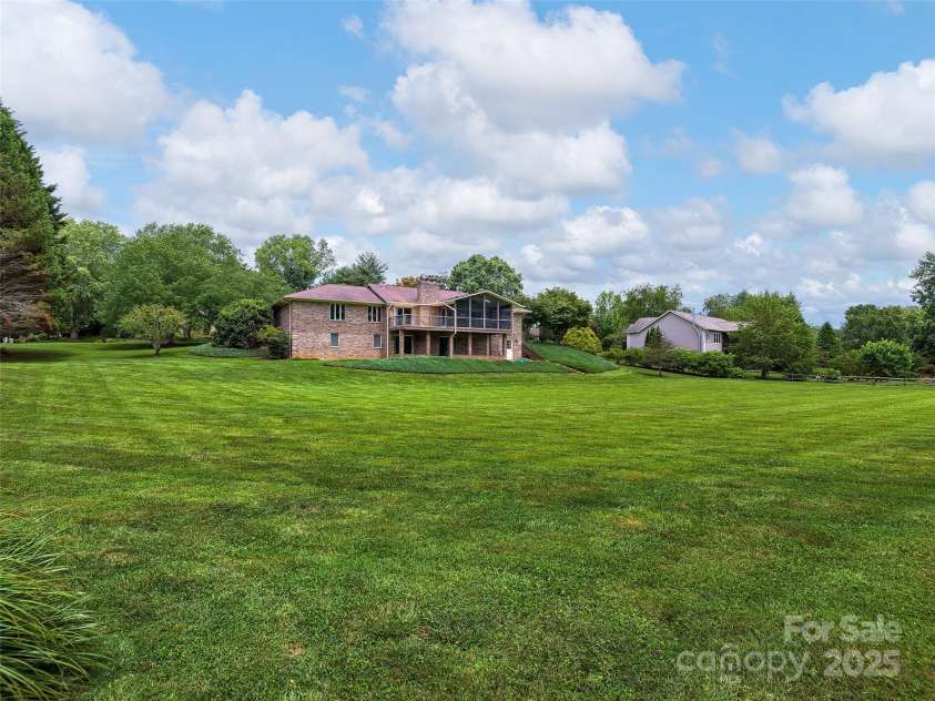 30 Beaumont Drive, Hendersonville, NC 28739.  MLS# CAR4282917, YatesRealty ID 26829. Back Exterior