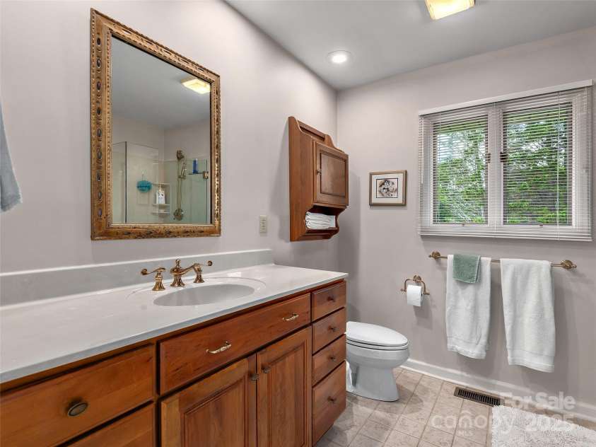 30 Beaumont Drive, Hendersonville, NC 28739.  MLS# CAR4282917, YatesRealty ID 26829. Primary Bathroom