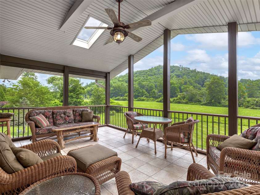 30 Beaumont Drive, Hendersonville, NC 28739.  MLS# CAR4282917, YatesRealty ID 26829. Screened Porch with Vaulted ceiling