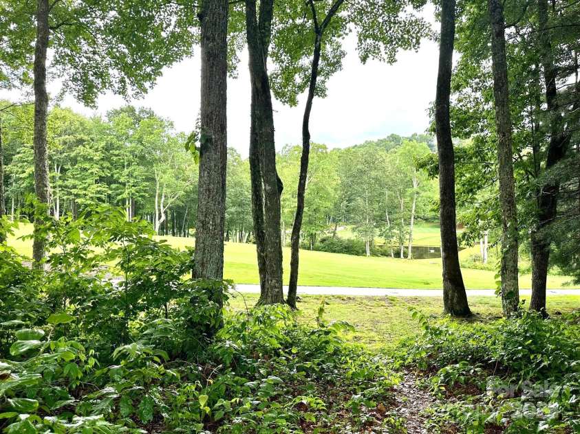 56 First Tee Trail, Cashiers, NC 28717.  MLS# CAR4283025, YatesRealty ID 26832. 