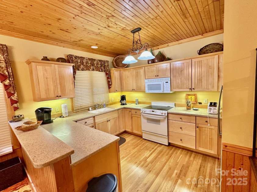 56 First Tee Trail, Cashiers, NC 28717.  MLS# CAR4283025, YatesRealty ID 26832. 