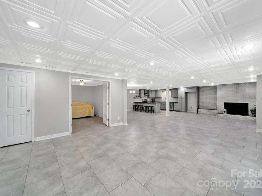 926 Meadow Lakes Road, Rock Hill, SC 29732.  MLS# CAR4269241, YatesRealty ID 26836. View of Finished Basement from Stairs