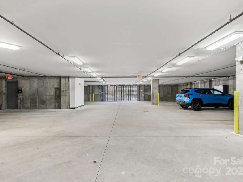 350 Allen Street, Hendersonville, NC 28792.  MLS# CAR4249399, YatesRealty ID 26837. Parking Garage