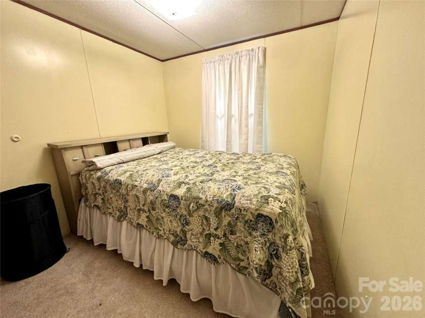492 Chestnut Mountain Road, Spruce Pine, NC 28777.  MLS# CAR4281456, YatesRealty ID 2684. Guest Bedroom 1
