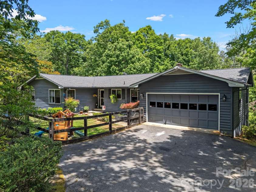707 Dogwood Trail, Tryon, NC 28782.  MLS# CAR4383954, YatesRealty ID 26840. 