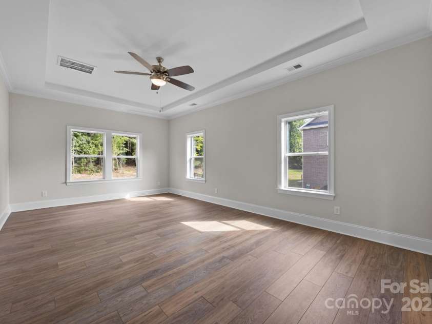 8605 Carly Lane, Mint Hill, NC 28227.  MLS# CAR4187633, YatesRealty ID 26845. 1st Floor Primary on rear of the home for ultimate privacy