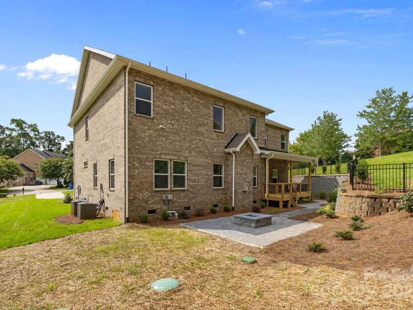8605 Carly Lane, Mint Hill, NC 28227.  MLS# CAR4187633, YatesRealty ID 26845. Firepit, extensive landscaping and hardscaping