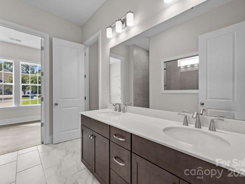 8605 Carly Lane, Mint Hill, NC 28227.  MLS# CAR4187633, YatesRealty ID 26845. Primary Bathroom and walk in closet