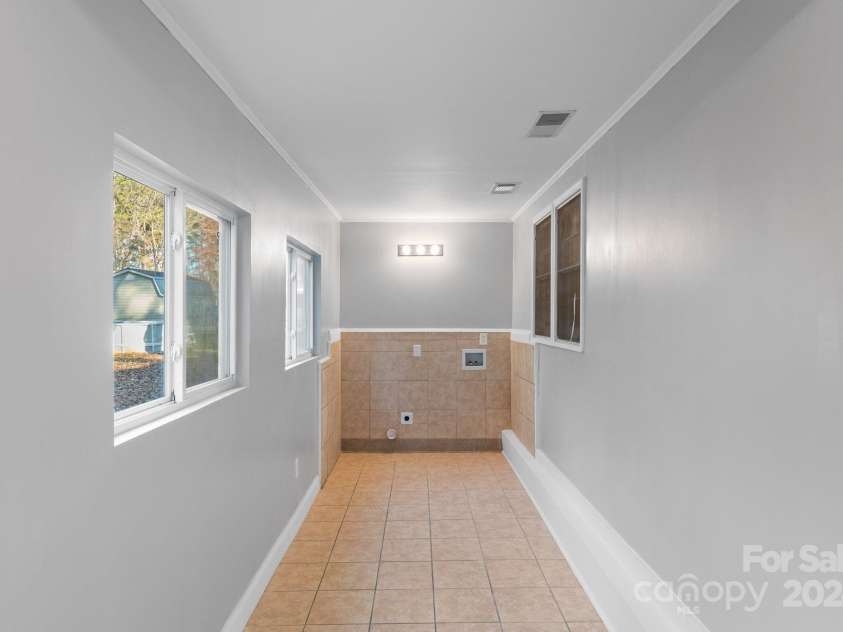 634 Colston Street, Albemarle, NC 28001.  MLS# CAR4208845, YatesRealty ID 2685. Laundry room